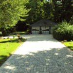 A tree lined driveway is shown here